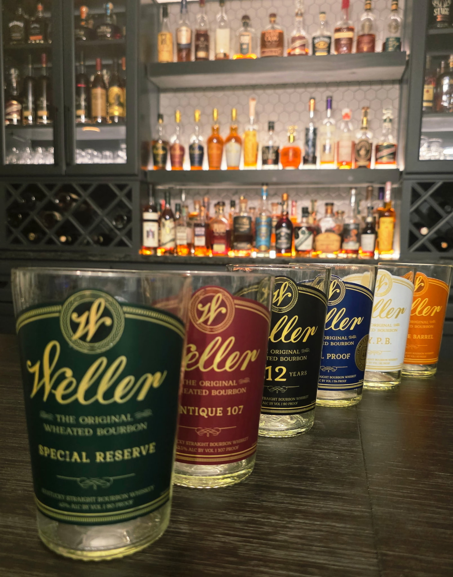 Second Pour Co. — bourbon glasses arranged on a bar top
